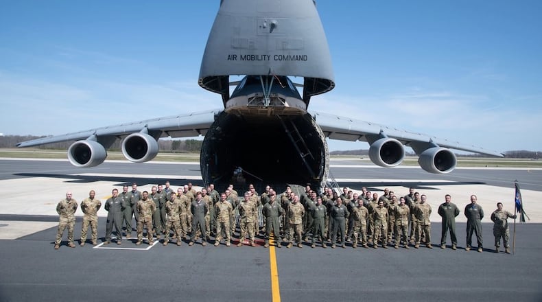 The 709th Airlift Squadron poses for a squadron photo, April 2, 2022, Dover Air Force Base, Delaware. Photo by Senior Airman Shayna Hodge