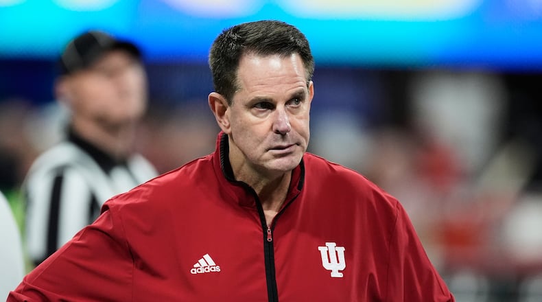 Indiana head coach Curt Cignetti walks on the field before the Peach Bowl NCAA college football playoff semifinal against Oregon, Friday, Jan. 9, 2026, in Atlanta. (AP Photo/Mike Stewart)