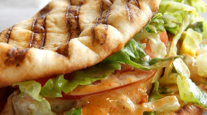 A flatbread sandwich from Topical Smoothie Cafe. 2017 file photo by Bill Lackey/Staff