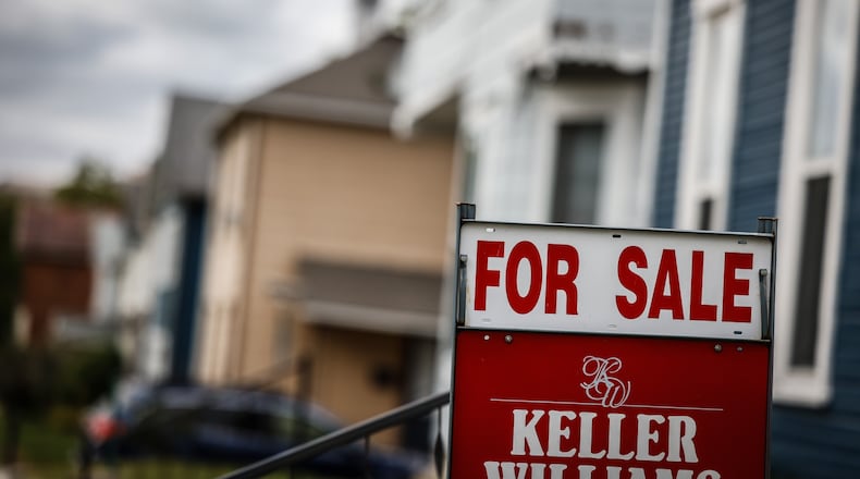 Surging mortgage rates and fast-rising home prices are cooling off a once red-hot housing market in the Dayton area. JIM NOELKER/STAFF