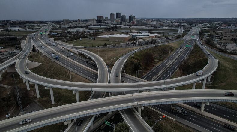 Holiday travel in Ohio is expected to be near pre-pandemic levels. In Ohio, 1.9 million will be traveling on the roadways. This is a drone photo of the convergence of U.S. 35 and Interstate 75 with the city of Dayton in the background. JIM NOELKER/STAFF