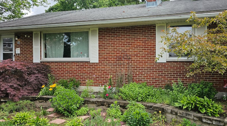 Angela Clay's home in West Carrollton was purchased as her starter home but she has been improving it and making it a forever home instead. CONTRIBUTED