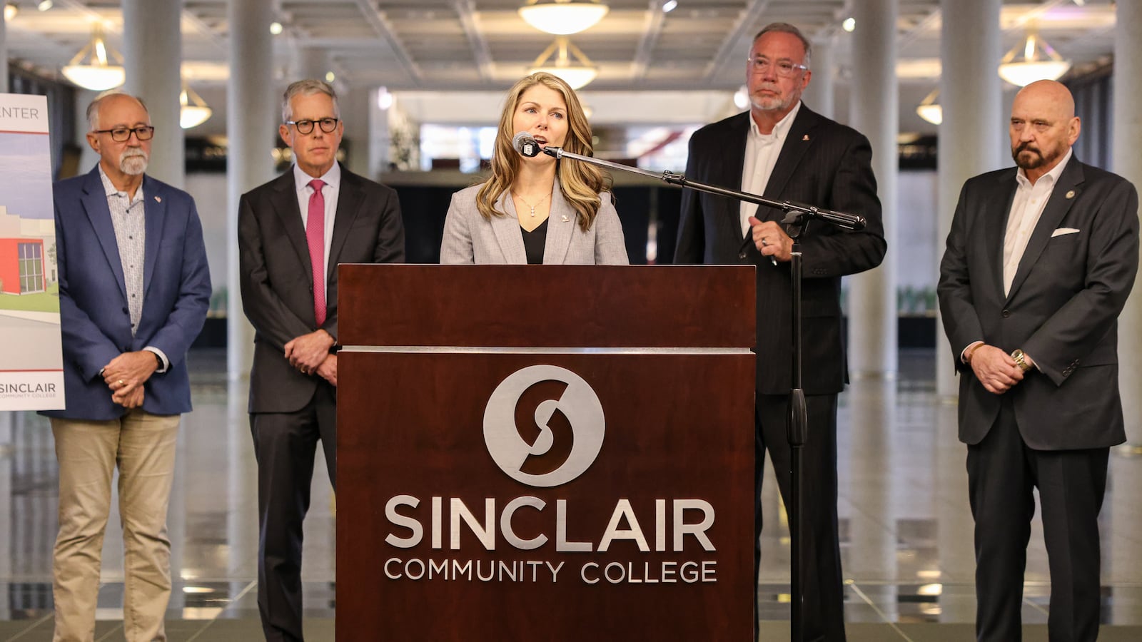 Sinclair Community College senior vice president Melissa Tolle speaks during a news conference on campus on Thursday, Nov. 20. The university announced it is spending $30 million to remodel Building 8, its former field house, and create a future technology center. BRYANT BILLING/STAFF