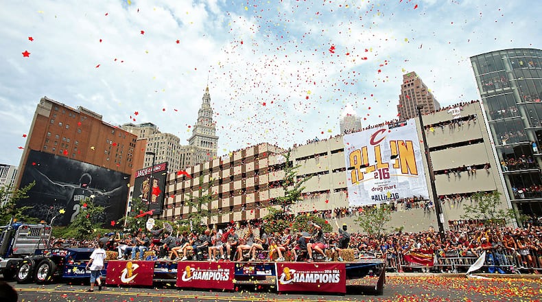 CLEVELAND, OH - JUNE 22: Confetti flies over the parade route during the Cleveland Cavaliers 2016 NBA Championship victory parade and rally on June 22, 2016 in Cleveland, Ohio. (Photo by Mike Lawrie/Getty Images)