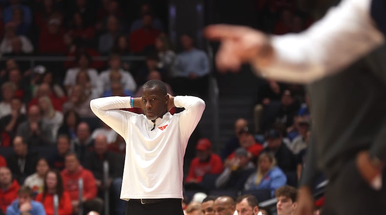 Dayton's Anthony Grant watches the action during a game against Duquesne on Saturday, Feb. 15, 2025, at UD Arena. David Jablonski/Staff