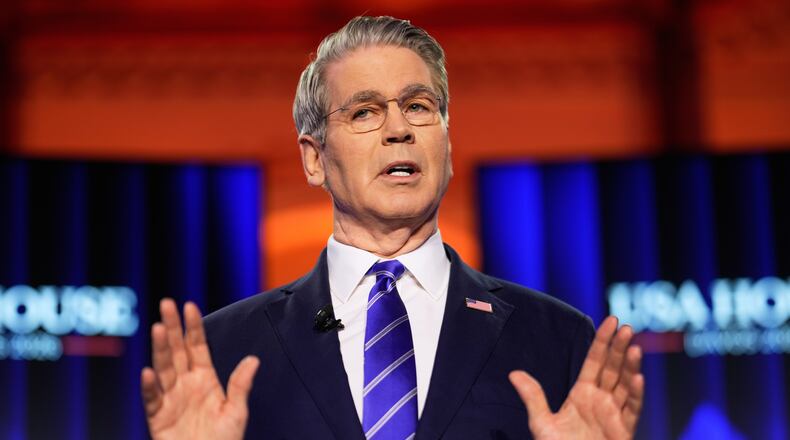 US Treasury Secretary Scott Bessent speaks at the USA house during the Annual Meeting of the World Economic Forum in Davos, Switzerland, Wednesday, Jan. 21, 2026. (AP Photo/Markus Schreiber)