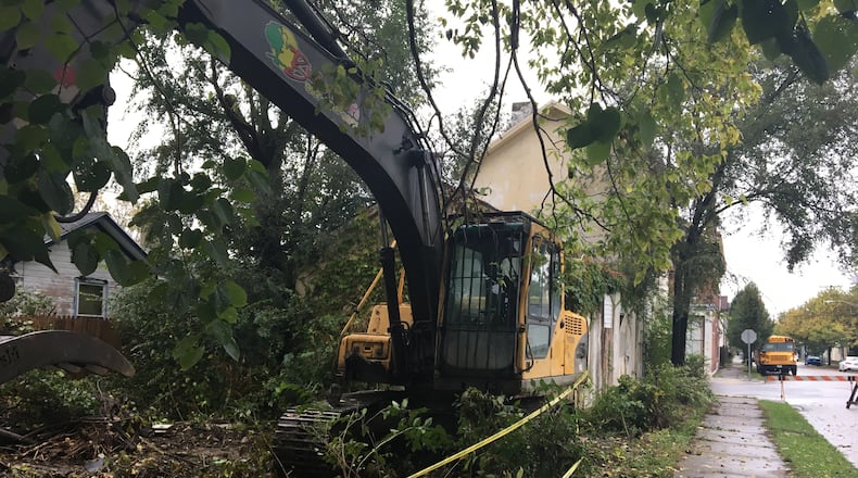 Dayton uses Community Development Block Grant funds to demolish blighted structures, repave residential streets and offer housing assistance. CORNELIUS FROLIK / STAFF