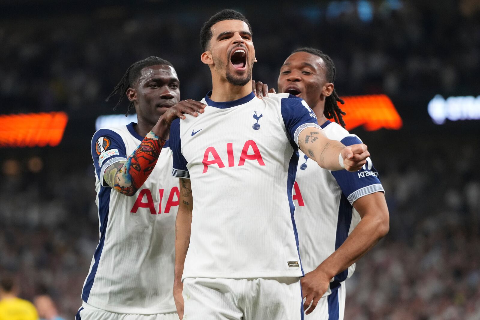 Tottenham's Dominic Solanke celebrates after scoring his side's third goal during the Europa League semifinal first leg soccer match between Tottenham Hotspur and Bodo/Glimt at the White Hart Lane stadium in London, Thursday, May 1, 2025. (AP Photo/Kirsty Wigglesworth)