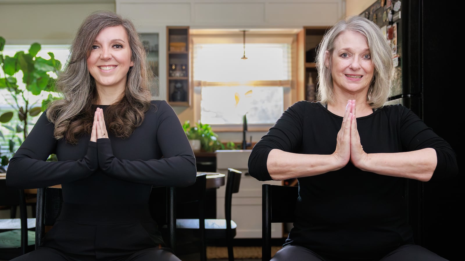Megan Moon (left) has been named a Dayton Daily News Community Gem. She was nominated by her mother, Debra Wilson (right). The two are in the goddess yoga pose. BRYANT BILLING / STAFF
