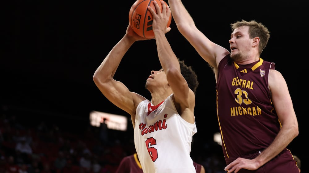 Miami’s Justin Kirby goes up for a shot against Central Michigan on Tuesday night at Millett Hall. ELIJAH COOK / CONTRIBUTED