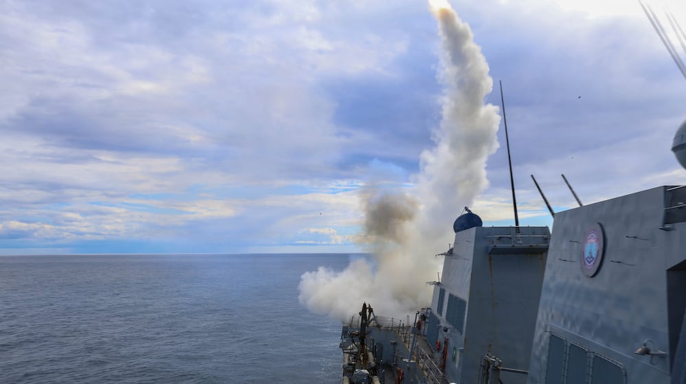 This image provided by U.S. Central Command shows the Arleigh Burke-class guided-missile destroyer USS Thomas Hudner (DDG 116) firing a Tomahawk Land Attack Missile (TLAM) in support of Operation Epic Fury, on Sunday, March 1, 2026. (U.S. Navy via AP)