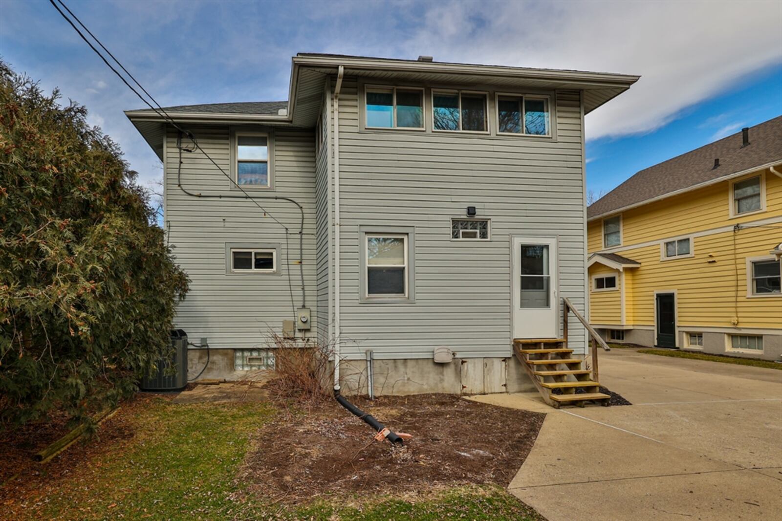 Located on one of the tree-lined boulevards of Oakwood, this two-story home at 14 E. Dixon Ave. in Oakwood has a traditional floor plan with some cozy built-ins and upstairs flexible space. CONTRIBUTED