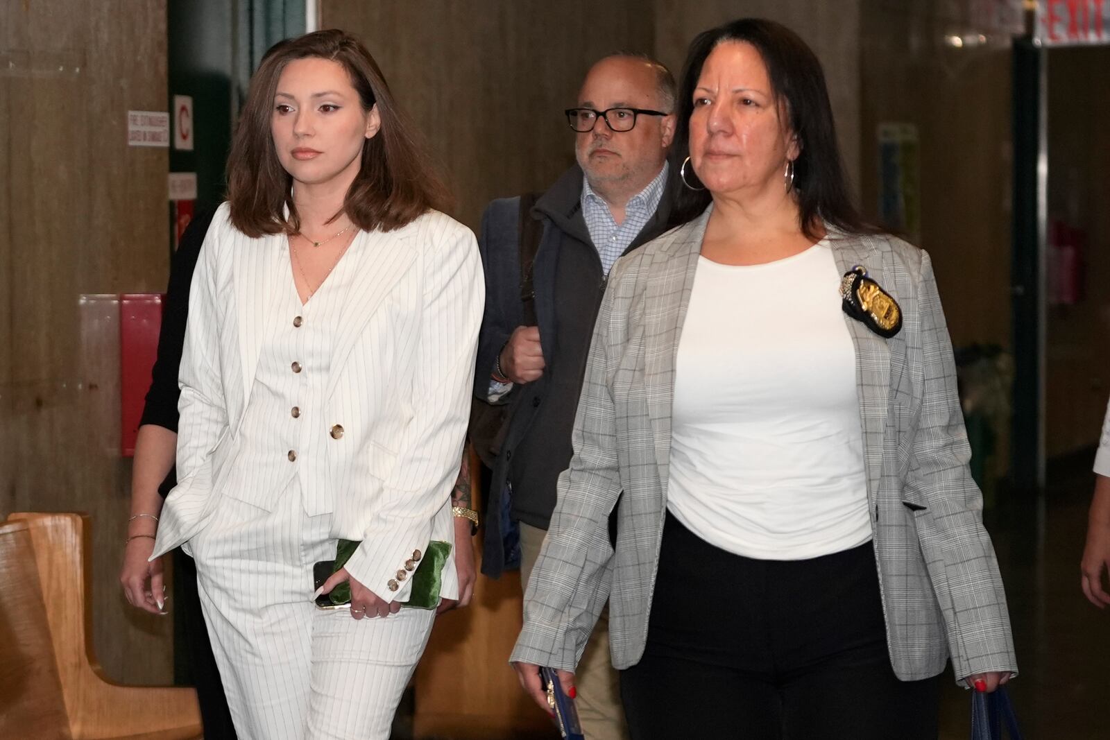 Jessica Mann, left, arrives at court before Harvey Weinstein's retrial in Manhattan, Wednesday, May 21, 2025, in New York. (AP Photo/Pamela Smith, Pool)