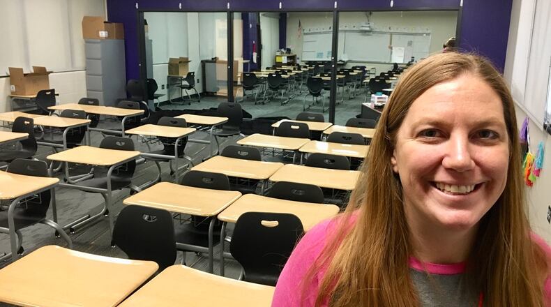 Middletown Middle School Teacher Leader Jennifer Hayes shows off the new school’s classroom viewing room used for undetected observations of teachers as they instruct students. Behind is a two-way mirrored wall that features a small viewing area on the other side so other teachers may observe - and learn from - the instructor being watched.