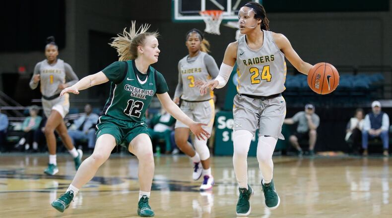 Wright State University’s Michal Miller is guarded by Cleveland State University’s Taylah Levy during their Horizon League Championship quarterfinal game on Thursday night at the Nutter Center. The Vikings won 63-52. CONTRIBUTED PHOTO BY MICHAEL COOPER