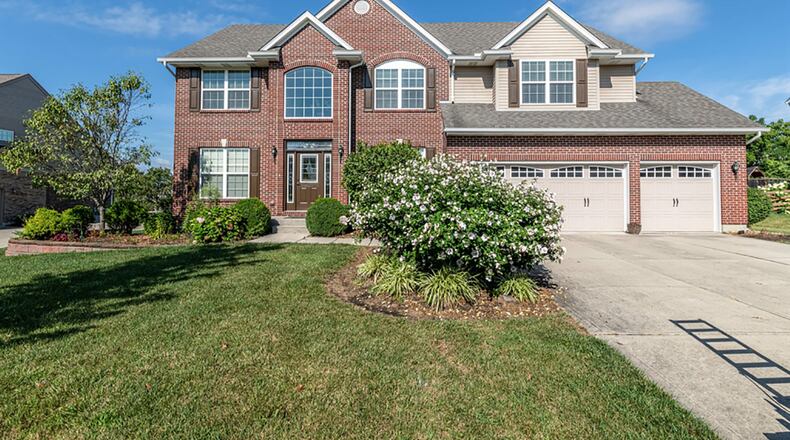 The 2-story home with about 4,000 sq. ft. of living space features volume ceilings, 4 bedrooms and a finished basement. CONTRIBUTED PHOTO