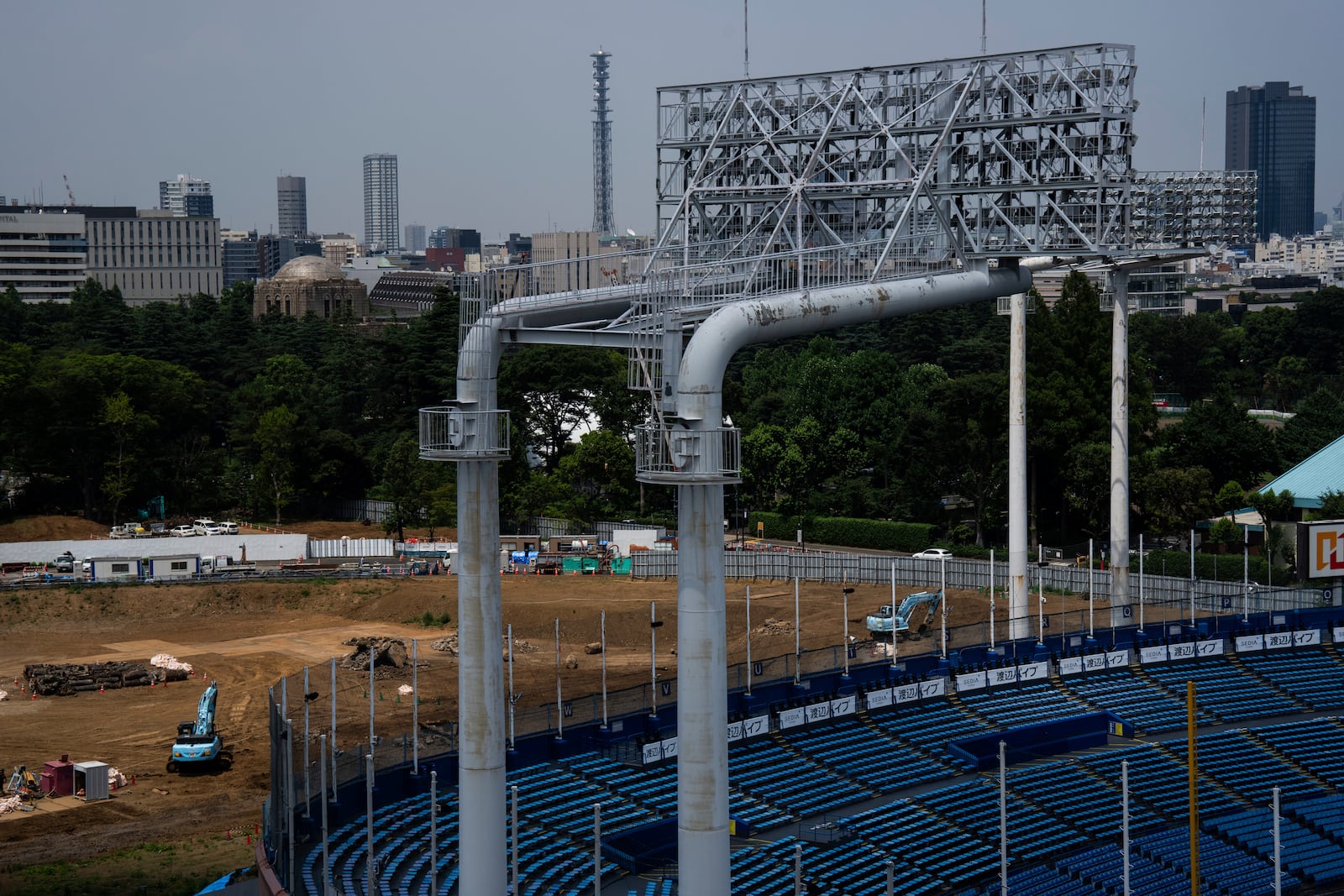 Construction site near the Jingu stadium in Tokyo, Wednesday, July 3, 2025. (AP Photo/Louise Delmotte)