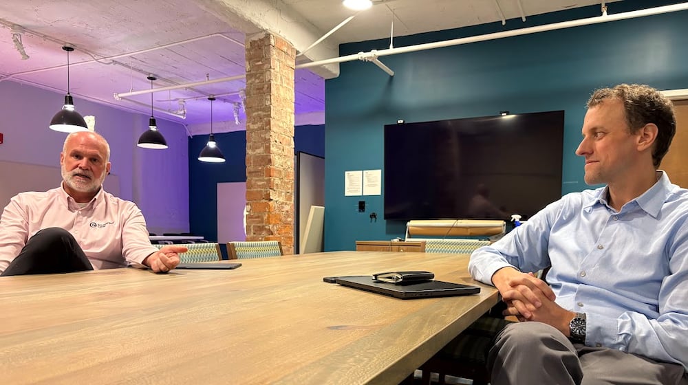 Scott Koorndyk, president of the Entrepreneurs Center in Dayton (left), with Mike McCann, chief operating officer of the center. Both men are concerned about the recent loss of Small Business Innovation Research federal funding for companies in the Dayton area. THOMAS GNAU/STAFF
