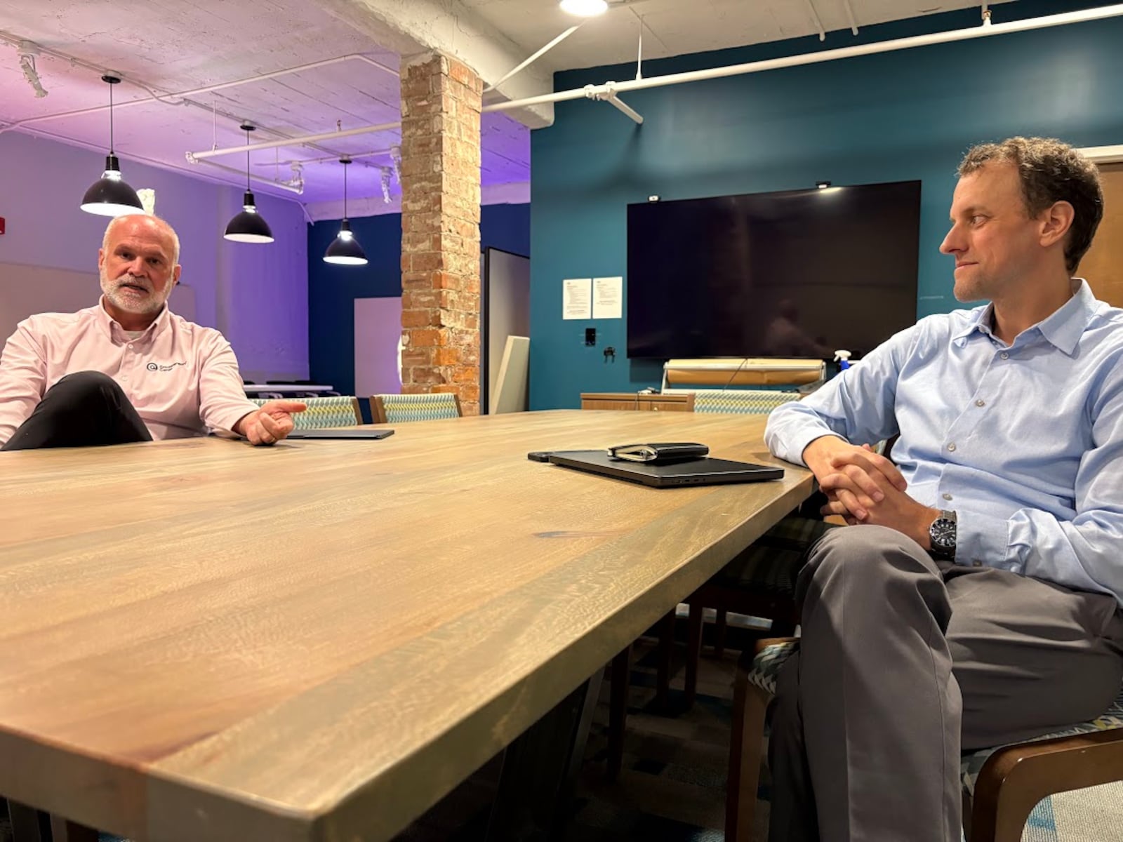 Scott Koorndyk, president of the Entrepreneurs Center in Dayton (left), with Mike McCann, chief operating officer of the center. Both men are concerned about the recent loss of Small Business Innovation Research federal funding for companies in the Dayton area. THOMAS GNAU/STAFF