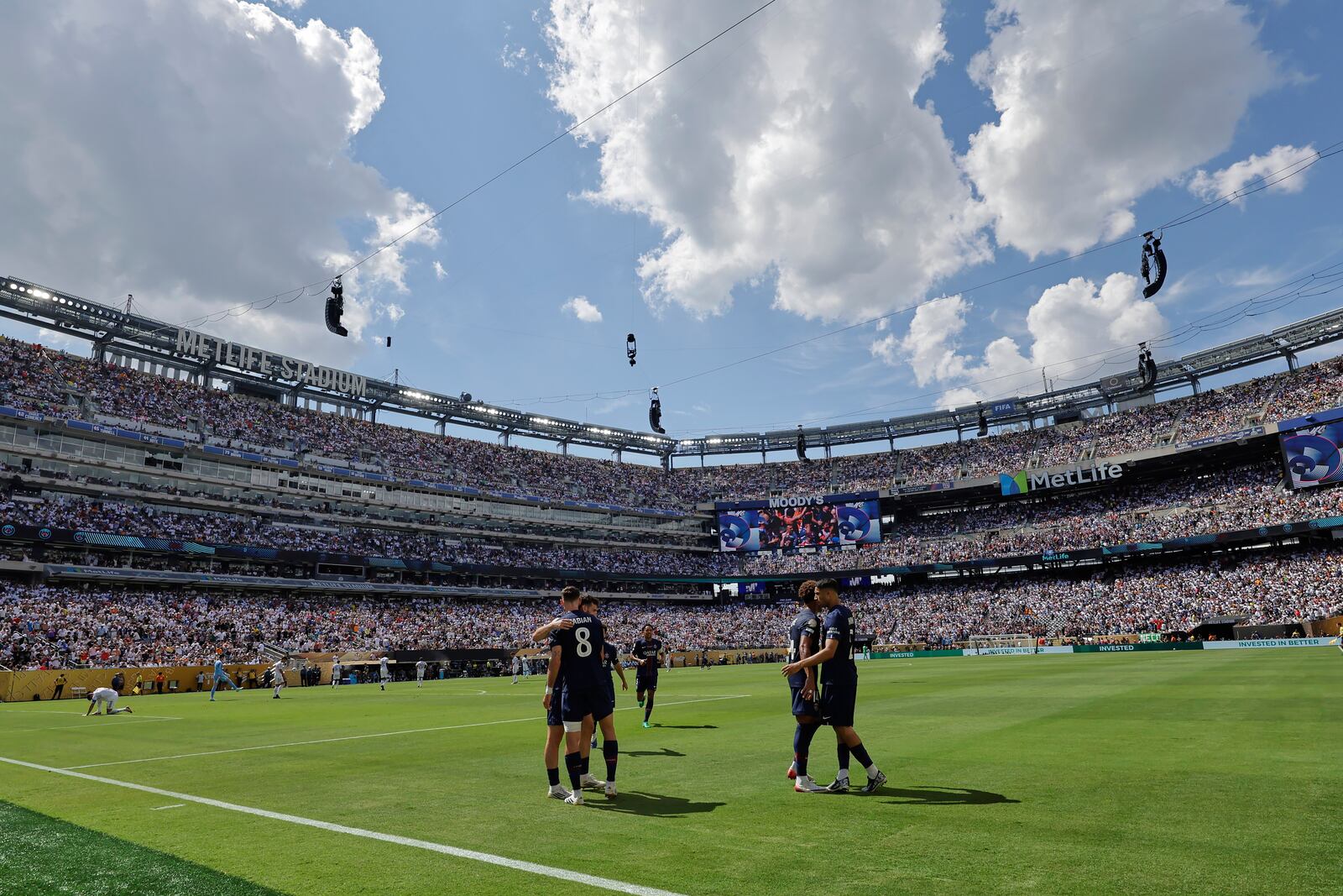 Paris Saint-Germain's Fabian Ruiz celebrates with team mates after scoring his side's third goal during the Club World Cup semifinal soccer match between PSG and Real Madrid in East Rutherford, N.J., Wednesday, July 9, 2025. (AP Photo/Adam Hunger)