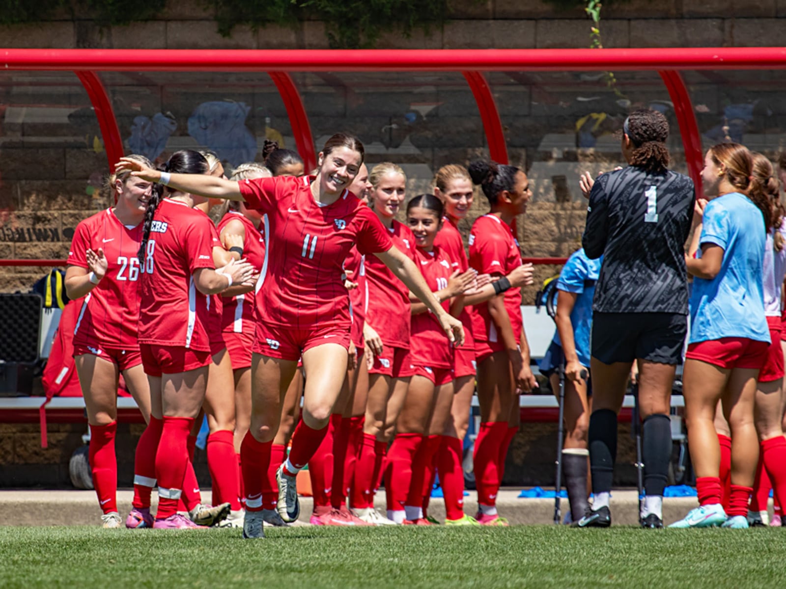 Dayton's Liv Grenda takes the field before an exhibition game against Michigan on Sunday, Aug. 3, 2025, at Baujan Field. DAYTON ATHLETICS / CONTRIBUTED PHOTO
