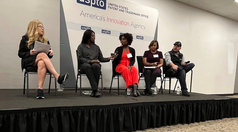 A panel spoke on the realities of small business entrepreneurship Thursday at Wright-Patterson Air Force Base's Hope Hotel. From the left: Kathi Vidal, of the U.S. Patent and Trademark Office; Charlynda Scales, CEO of Mutt's Sauce LLC; Alicia Brown, founder of Write With Mrs. Brown LLC; Lisa Coker, CEO of Infinite Management Solutions; and Nicholas Ripplinger, president of Battle Sight Technologies. THOMAS GNAU/STAFF