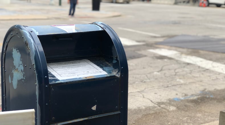 This mailbox near the Dayton Public Schools administration building and the Dayton Arcade has been decommissioned. CORNELIUS FROLIK / STAFF