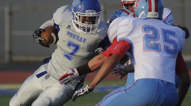 Dunbar RB Tavion Thomas. Belmont defeated Dunbar 42-0 in a season-opening high school football game at Welcome Stadium in Dayton on Thursday, Aug. 24, 2017. MARC PENDLETON / STAFF