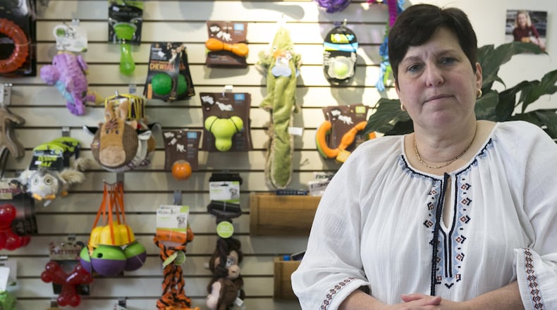 Andrea Deutsch, 50, stands in her Narberth pet store on Forrest Avenue on the morning of Friday, June 22, 2018. She has dealt with Type 1 diabetes almost her whole life. Before the Affordable Care Act, she struggled to find affordable health insurance that would cover what they considered a pre-existing condition and she worries about how she would pay for care if the ACA protections went away. (Maggie Loesch/Philadelphia Inquirer/TNS)