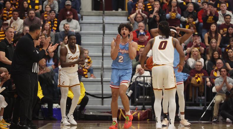 Dayton's Nate Santos reacts to a foul call during a game against Loyola Chicago on Friday, March 1, 2024, at Gentile Arena in Chicago. David Jablonski/Staff