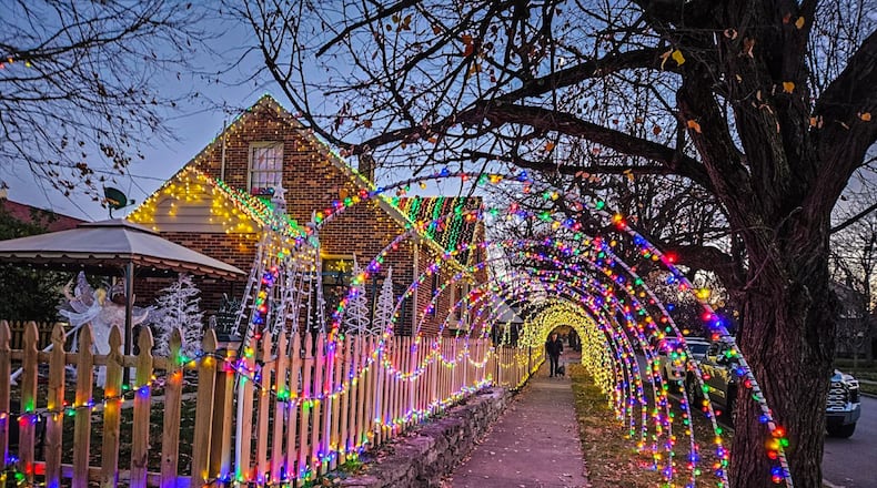 An Oakwood resident with an elaborate outdoor holiday lights display is asking the city to approve a process for a seasonal permit allowing such exhibits in the public right of way. CONTRIBUTED