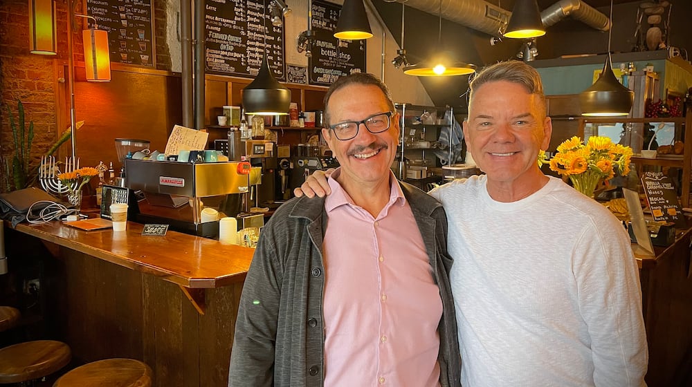 Joshua Stucky (right) and his best friend of 42 years, Tim Farquhar, are transitioning Ghostlight on Wayne Avenue in Dayton into Wayne & Clover, a coffee shop with a goal of being “a viable part of the community.” NATALIE JONES/STAFF