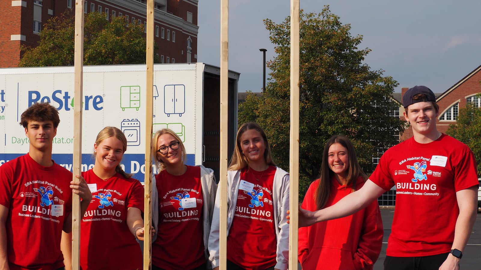 More than 400 University of Dayton first-year business students and faculty volunteers built walls for a Habitat for Humanity home Saturday. BRYN DIPPOLD/STAFF