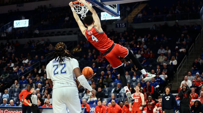Dayton's Koby Brea dunks against Saint Louis on Tuesday, March 5, 2024, at Chaifetz Arena in St. Louis, Mo. David Jablonski/Staff