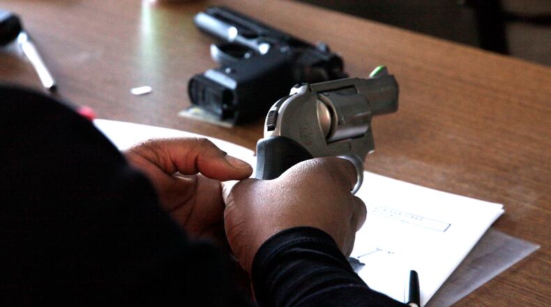 Sanford Whitlow has been teaching CCW classes since it became legal in Ohio to conceal and carry a firearm. STAFF FILE