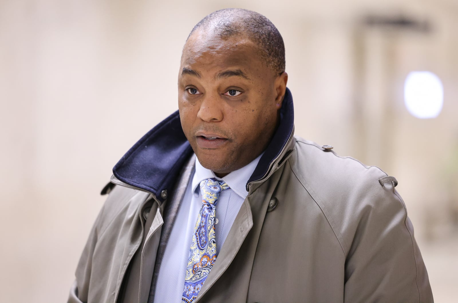 Attorney Ryan Nelson talks to a reporter following a hearing on Wednesday, Jan.  28, 2026, outside a courtroom in Montgomery County Common Pleas Court. Nelson represents Matthew Currie, an Oakwood attorney accused of stalking and secretly recording a teenage girl and several women. Nelson said Currie, who has a rare parkinsonism disease, is receiving care in an ICU. BRYANT BILLING/STAFF