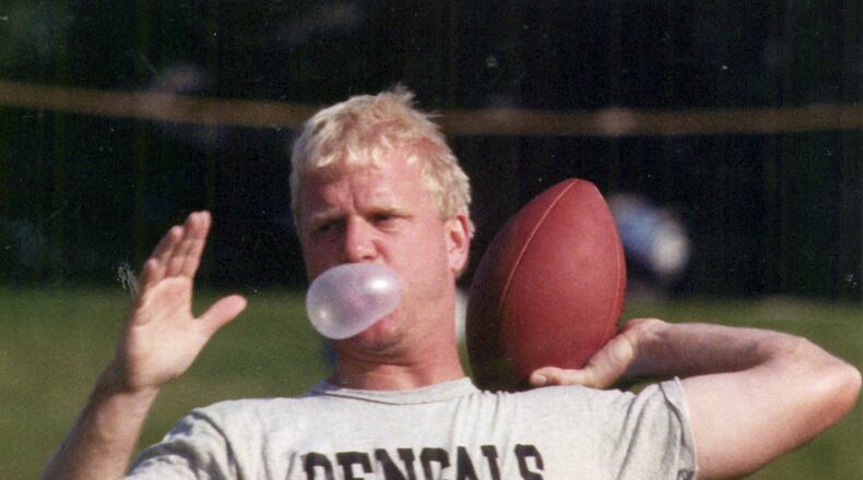 Bengals training camp at Wilmington College. Boomer Esiason blows bubbles while throwing. 7-25-1990