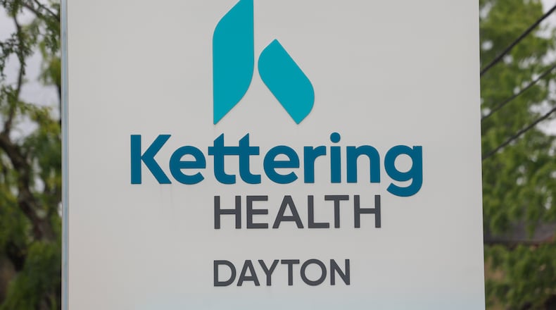 The sign of the Kettering Health Dayton near the main entrance on Thursday, May 22, 2025. JOSEPH COOKE/STAFF