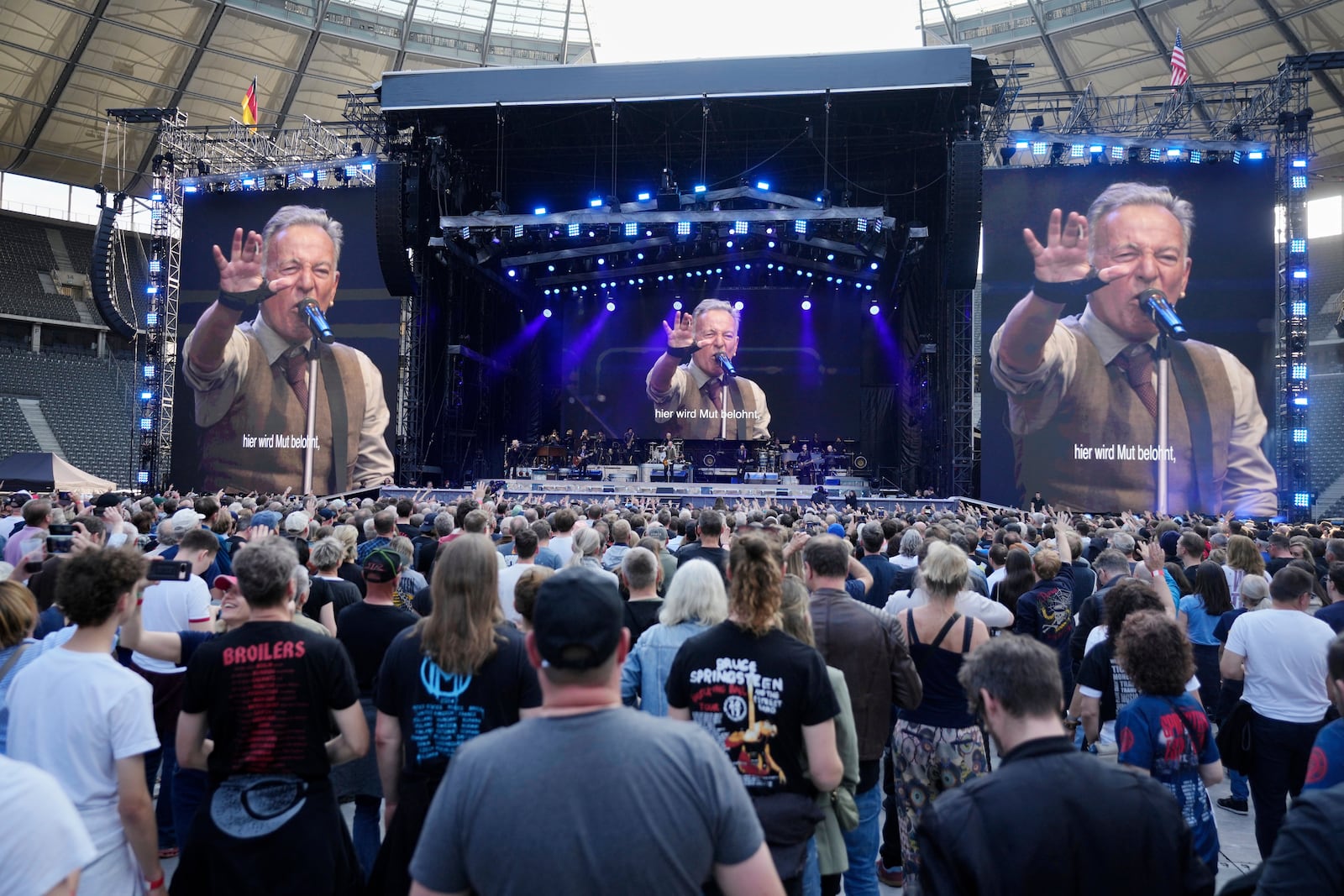 Bruce Springsteen performs with the E Street Band at the Olympic Stadium in Berlin, Germany, Wednesday, June 11, 2025. (AP Photo/Markus Schreiber)