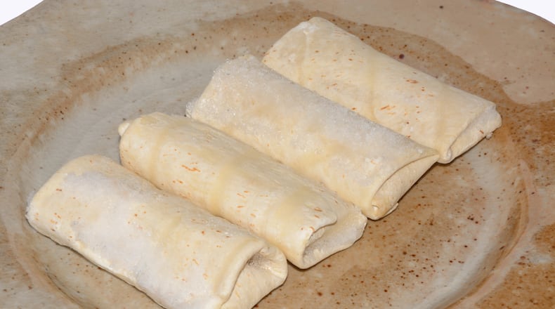 Whitney King's children sometimes have breakfast burritos for First Dinner, formerly known as an after school snack. ISTOCK