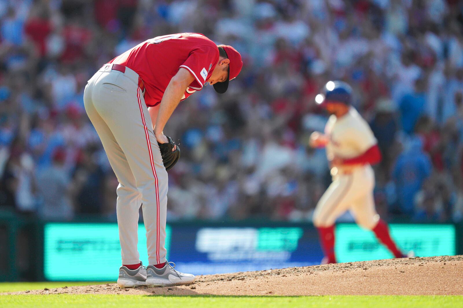 Cincinnati Reds pitcher Nick Lodolo reacts after giving up a two-run home run to Philadelphia Phillies' Alec Bohm during the sixth inning of a baseball game, Saturday, July 5, 2025, in Philadelphia. (AP Photo/Derik Hamilton)