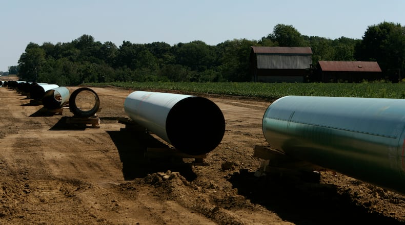 Pipe laid out in Central Indiana farmland on its way to Ohio in 2008. The $5 billion project was built to move natural gas from the Rocky Mountains to Ohio. Jim Noelker/Dayton Daily News