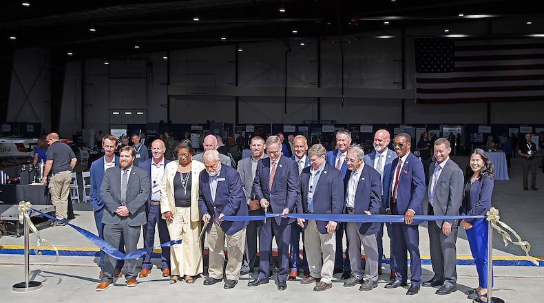 Springfield, state and national officials cut the ribbon for the new National Advanced Air Mobility Center of Excellence at Springfield-Beckley Airport Monday, Sept. 18, 2023. BILL LACKEY/STAFF