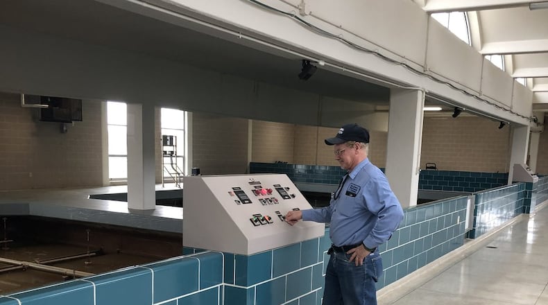 David Huff, a city of Dayton water treatment plant operator, washes a filter while also practicing social distancing at the city’s Miami Water Treatment Plant on March 3. City water treatment employees continue to ensure customers get clean drinking water while also protecting themselves and co-workers during the COVID-19 pandemic.| CONTRIBUTED