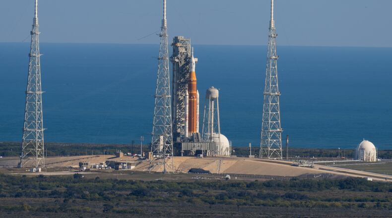 This photo provided by NASA shows the Artemis II SLS (Space Launch System) rocket with the Orion spacecraft atop a mobile launcher at Launch Complex 39B, Thursday, Jan. 29, 2026, at NASA's Kennedy Space Center in Florida. (Jim Ross/NASA via AP)