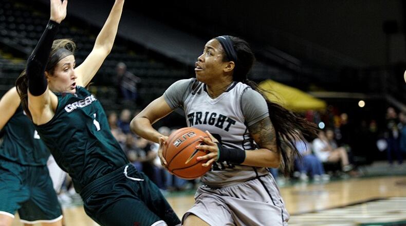 Wright State’s Chelsea Welch drives into the lane against Green Bay on Feb. 24, 2017 at the Nutter Center. Tim Zechar/Contributed
