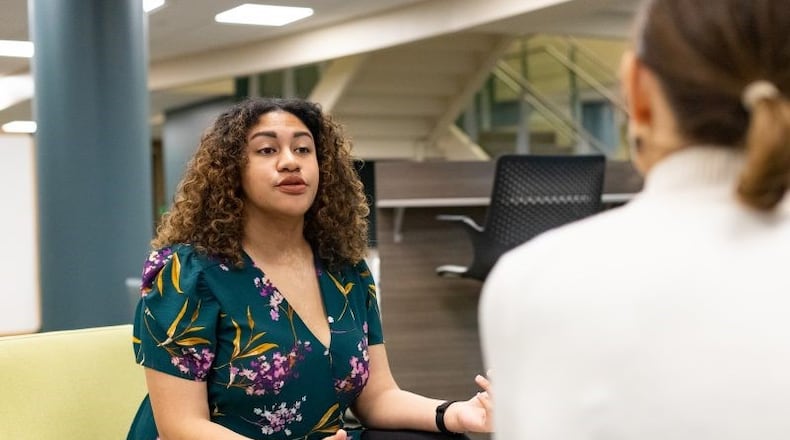 Johnjé Jasper (left), RN, CHW program administrator, explains the program to an interested candidate.
Photos by Joel Granados, Kettering College Communications Specialist