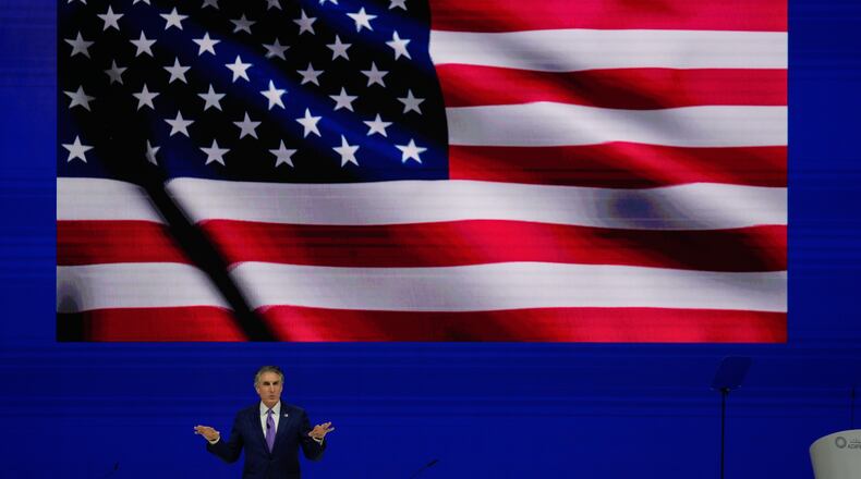 CORRECTS NAME SPELLING - U.S. Interior Secretary Doug Burgum speaks during the inaugural session of annual Abu Dhabi International Petroleum Exhibition and Conference (ADIPEC), in Abu Dhabi, United Arab Emirates, Monday, Nov. 3, 2025. (AP Photo/Altaf Qadri)