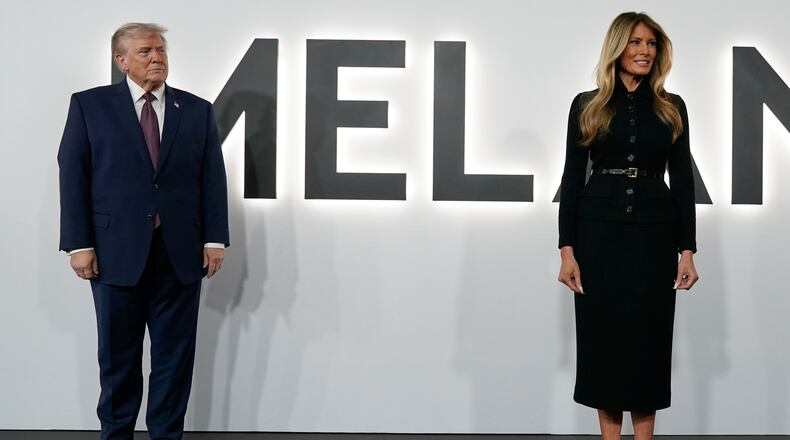 President Donald Trump and first lady Melania Trump arrive for the premiere of her movie "Melania" at The John F. Kennedy Memorial Center For The Performing Arts, Thursday, Jan. 29, 2026, in Washington. (AP Photo/Jose Luis Magana)