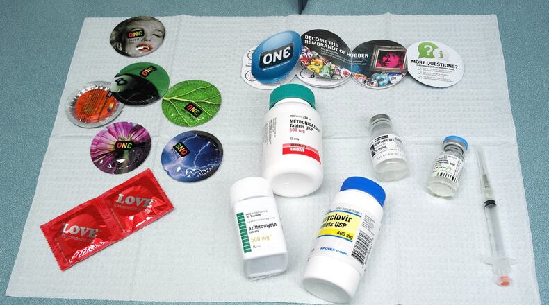 An assortment of condoms and medication the Clark County Combined Health District uses to treat STD’s. BILL LACKEY/STAFF
